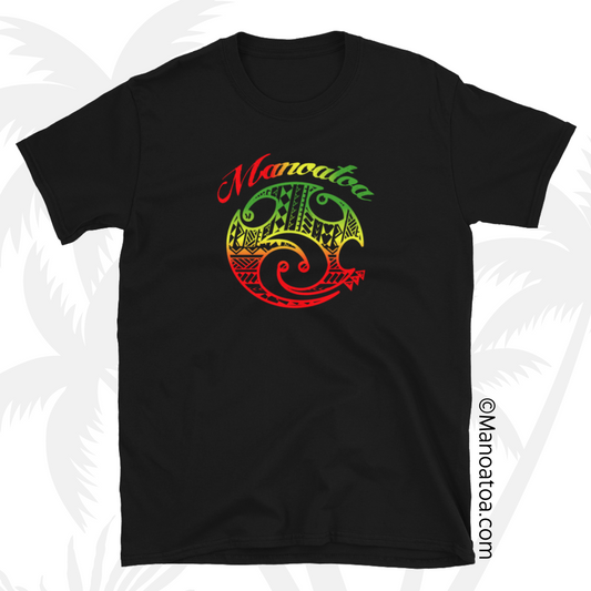 A casual T-shirt sporting the Manoatoa brand logo, featuring a Polynesian-style design. The colors are island reggae-inspired hues of red, yellow, and green, with the word "Manoatoa" prominently displayed above the logo. 